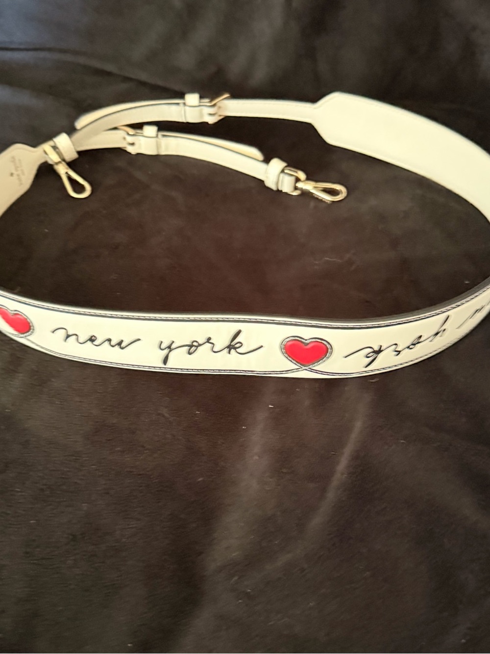 kate spade White Leather Strap with Red Heart & 'New York' Script